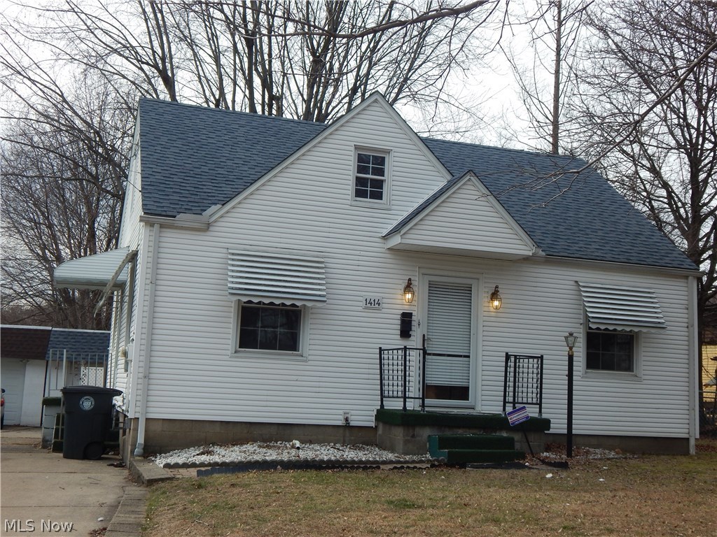 Updated hardwood floors, newer bath. Full basement, split shared driveway.