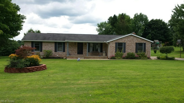 This home has been well maintained and has so many wonderful updates. IT'S MOVE IN READY! There is new paint throughout the home. 2020 sq.ft brick ranch home in Lake Local Schools. First floor 1446sq.ft. Walkout finished basement 574sq.ft. completely refinished basement including full bathroom, woodburning stove with new chimney/flue liner in 2004. Possible 4th bedroom in basement. INGROUND POOL!! 17x38 Inground Heated Pool (250,00btu heater, as well as solar heating system) with diving board, slide and 15'x 12' pool house.New pool liner and filter system 2012. Deck and privacy fence restained.4'X8' outdoor bar with refrigerator. 8'x10' Storage shed. 21'x22' Mechanics dream garage. Complete with hot/cold running water, floor drain,gas heat, 220 volt outlet with additional 110 volt outlets.30 year pergo floors installed 2010.New hot water tank installed 2005. Furnace 90% efficiency.Beautiful kitchen cabinets compliment the Corian countertops/double sinks installed in 2005. 3 full bathro