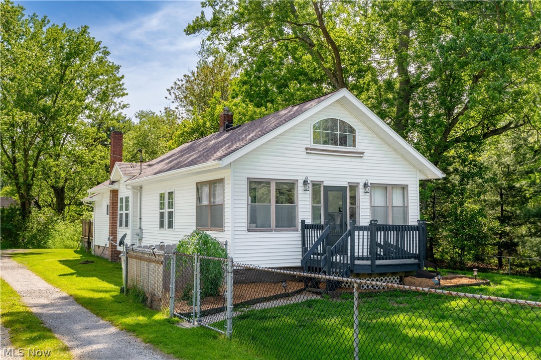 Walking distance to Tallmadge Circle (Circle Fest access), Coffee shops, and Restaurants.  Adorable cape cod that was passed down through the family until now.  Open floor plan. Loft bedroom with second floor living space and other bedroom.  Main floor bedroom and bathroom.  Many updates with recent owner.  New Furnace 2026. New AC 2024. water tank 2025. shared driveway.  fenced front yard.  large unattached 2.5 car garage with 220v wired (mechanics garage).  All appliances stay EXCEPT for washer and dryer.