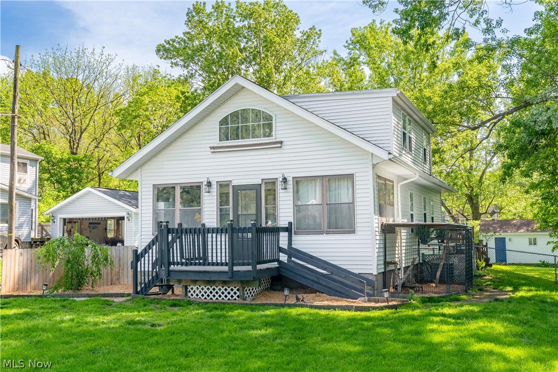 Walking distance to Tallmadge Circle (Circle Fest access), Coffee shops, and Restaurants.  Adorable cape cod that was passed down through the family until now.  Open floor plan. Loft bedroom with second floor living space and other bedroom.  Main floor bedroom and bathroom.  Many updates with recent owner.  New Furnace 2026. New AC 2024. water tank 2025. shared driveway.  fenced front yard.  large unattached 2.5 car garage with 220v wired (mechanics garage).  All appliances stay EXCEPT for washer and dryer.