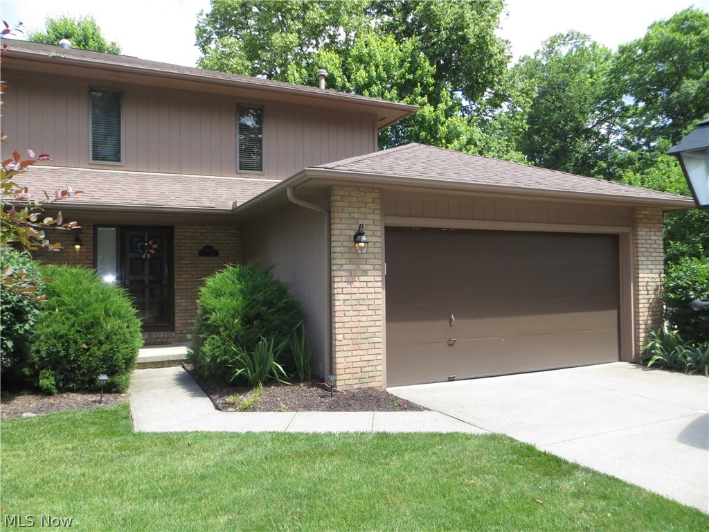Tucked away in Spy Glass Hill, surrounded by mature trees & tranquil setting, is the Buccaneer Woodlands Condominium Community. Here, townhouse style homes are the perfect choice for those in search of maintenance free living. 18606 Buccaneer Creek Dr. offers 1606 sqft of living space & has a finished lower level, a feature not common in most Strongsville condos. The kitchen was updated in 2016 with unique countertops and backsplash, white cabinetry, and stainless appliances.  Engineered wood flooring flow gently through the dining and living areas.  The living room is adorned with a woodburning fireplace, classic mantel, and dual accent windows.  Access to the private yard and shaded deck, is available off the dining area through the Therma-Tru Slider installed in 2018. A first-floor laundry area with cabinets, laundry rack and utility tub installed in 2017, washer/dryer 2017, and a full pantry offers convenience.  Half bath remodeled in 2016.  The second floor is accessible off the foyer.  The stair landing was updated with LVT flooring and the stairs have newer pet-friendly carpeting.  A quaint nook at the top of the stairs separates two spacious bedrooms.  The master bedroom is located at the back of the home. Its en-suite glamor bath was remodeled in 2016. A soaking tub is warmed by the light from the skylight. The walk-in shower has glass doors, a shower seat and built-in shelving. The vanity has dual sinks, Corian counters, and is steps away from the walk-in closet.  The second bedroom is nicely-sized has a walk-in closet. Its en-suite bath provides for a shower/bathtub combo and a vanity with plenty of counter space. The lower level has a finished recreation area perfect for moving nights, work-out room, or even a home office. The central air was replaced in 2017, Furnace 2016 & ignitor 2025, HWT 2016, newer main waterline shut-off valve. Storage under the steps. The roof and skylights were replaced by the HOA in 2009. Garage door spring replaced 2025.