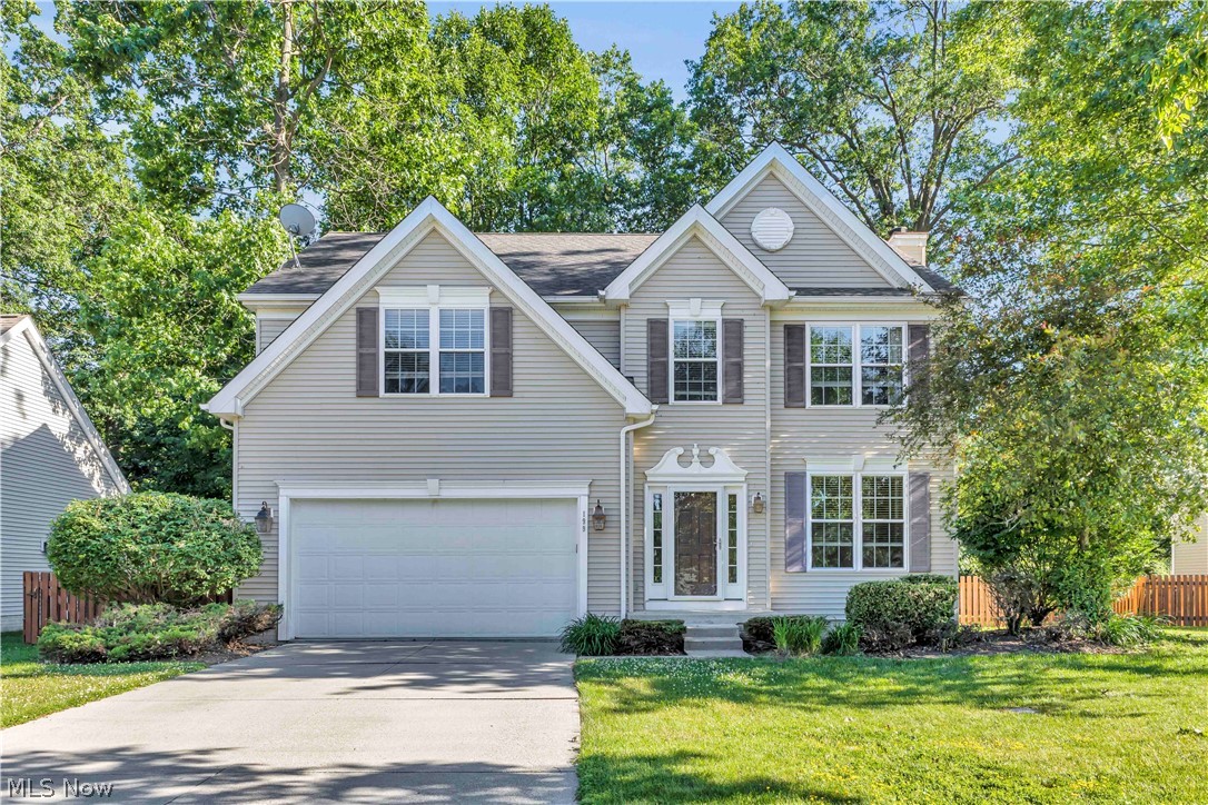 Welcome home to 199 Highland Ave in Avon Lake! This beautifully maintained 3-bedroom, 2.5-bath home is the one you have been waiting for!  From the moment you arrive, you'll appreciate the home's charming curb appeal and welcoming presence. Step inside to discover an open, easy-flowing floor plan designed for both everyday living and entertaining.  The impressive great room features soaring volume ceilings, a cozy fireplace, and a stunning wall of windows that fills the space with natural light.  The well-appointed kitchen offers abundant cabinet and counter space, making meal preparation a breeze, while the adjoining morning room provides the perfect setting for casual breakfasts, family dinners, or gathering with friends. Just beyond, step outside to the fully fenced backyard and patio—an ideal extension of your living space for outdoor dining, summer barbecues and relaxing evenings.  The main level also includes a versatile office/den that can easily serve as a home workspace, playroom, or formal dining space, along with a convenient first-floor laundry room and half bath.  Upstairs, retreat to the spacious primary suite featuring a walk-in closet and private en-suite bath. Two additional bedrooms and a comfortable loft area offer plenty of room for family or guests.  The unfinished basement provides exceptional storage today and endless possibilities for future expansion—whether you envision a recreation room, home gym, or additional living area.  Outside, the generously sized, fully fenced backyard is perfect for pets, play, and entertaining.  Mechanical updates provide added peace of mind, including a furnace and air conditioner approximately one year old and a hot water tank replaced just a few years ago.  A perfect location near Lake Erie, parks, shopping, dining, and everyday conveniences, this move-in-ready home truly has it all. Don't miss your opportunity to make 199 Highland Ave your next home—schedule your private showing today!