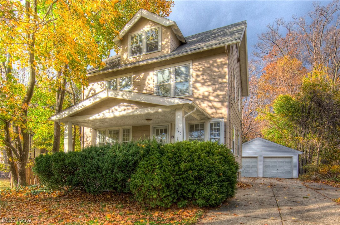 Adorable Front Porch Colonial! ***Check Out the 360 Degree Panoramic Virtual Tour!*** Move Right Into this Fully Remodeled Four Bedroom Home! Light and Bright Living Space with Hardwood Floors, Fireplace, and Built In Shelving! Large Formal Dining Room with Hardwood Floors! Beautifully Remodeled Galley Kitchen with Tile Flooring, Maple Cabinets, and Custom Tile Backsplash! Three Sizable Bedrooms on the Second Floor have been Freshly Painted and Have Gorgeous Hardwood Floors! Updated Full Bath on Second Floor has Custom Tilework, Newer Vanity, and Fixtures! Finished Third Floor Offers an Additional Bedroom and Large Walk-In Closet! Full Basement with Additional Full Bath!  Two Car Garage! Home Warranty Included! Minutes from University Circle, Hospitals, and Museums! Walking Distance to Shops!
