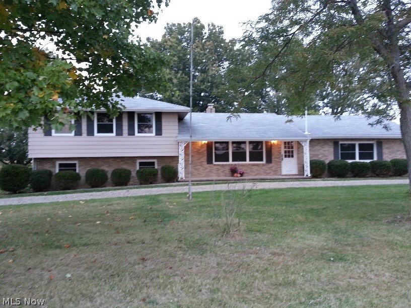 If you need space inside and outside this house should be on your "must see" list. New flooring includes alot of hardwood, ceramic and carpet. New windows, lighting, new baths, garage doors. Huge new kitchen-cabinets, counter top, tile floor, tile back splash. New furnace/AC. New water heater. Basement has been water-proofed. Even a new water well. Passing inspections on water/septic tests!