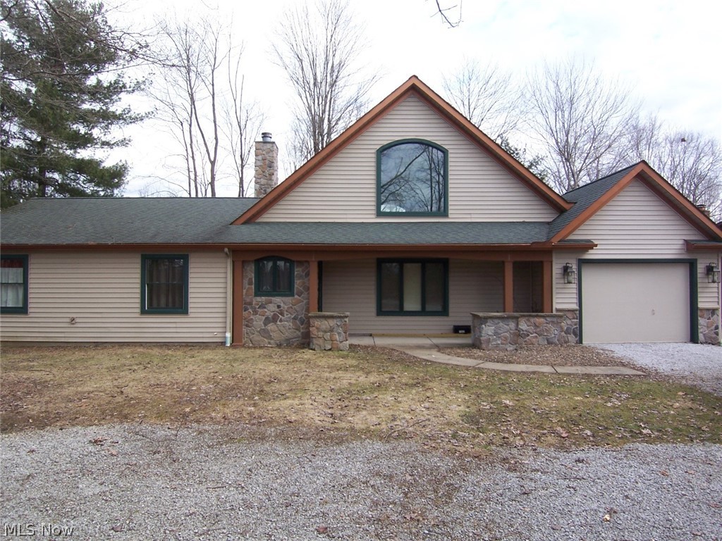 Cute Cabin in the Woods! Secluded lake front home  in a great location with superb views of the lake. Nice wooden dock to fish, swim, and boat from. Just seconds to the main lake! Swim across to the beach and pool!  Nice level lot so no steps to the dock and lake!  Huge 33'x15' deck off main living and dining rooms with a contemporary cable railing so as not to block the great view. Sit on the deck and enjoy the annual fireworks. Spacious open main living area with windows from the floor to the vaulted ceiling, and a 3 sided wood fireplace. This space consists of the kitchen, living, dining, and sitting rooms, as well as the bar. Big 25'x9' screened porch accessible from sitting room and master bedroom. Nice sized master with master bath has views of the lake! 2 other bedrooms share a good sized bath. Nicely treed without much mowing. Very large storage room connected to the garage that is accessible from garage or outdoors. Very functional! Call today to find out more!