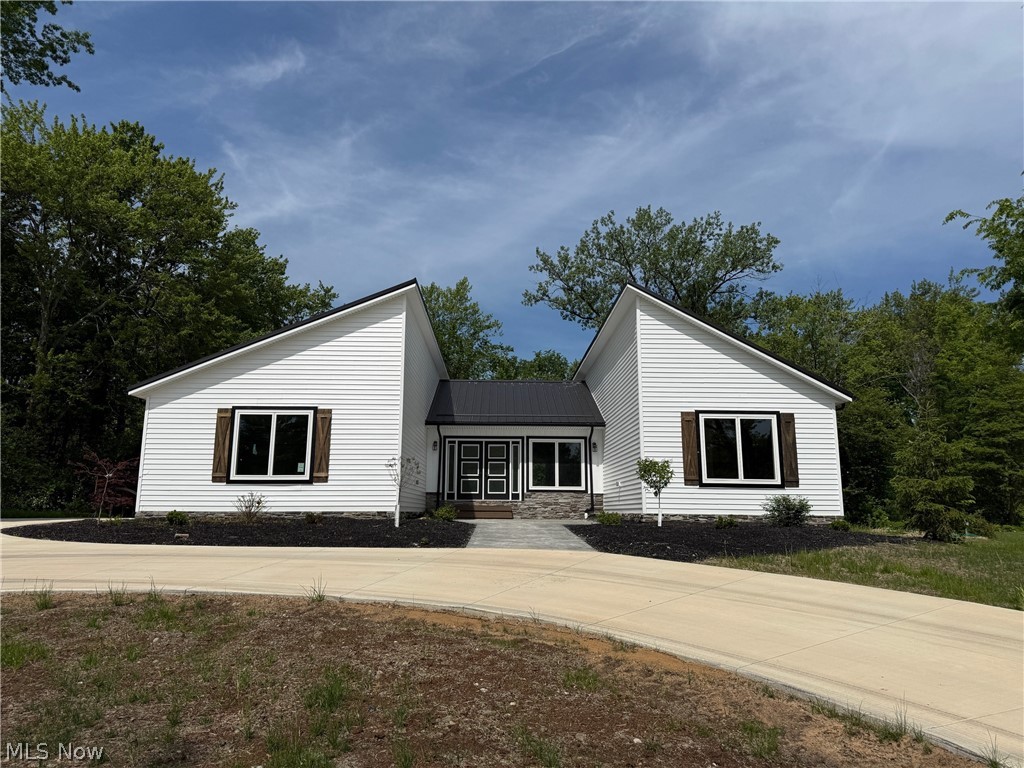 New construction ranch home with over 3000 square feet of finished space, including the finished basement rec room and full bath, set on a beautiful two-thirds acre lot! This single-level design offers four bedrooms and three full bathrooms on the main floor. The open-concept layout seamlessly connects the spacious living room with gas fireplace, dining area, and chef’s kitchen which includes a 48" gas range, smart refrigerator, drawer microwave, dishwasher. Primary suite includes 2 walk-in closets, en-suite bath with 2 separate vanity areas, private commode area, plus a walk-in shower with body jets, Blue Tooth speakers, LED lighting, rainfall shower. An attached two-car garage is included, and there’s room on the property to add an outbuilding (available as an upgrade with the builder). The extra-deep basement will be partially finished, adding a bath, additional living area, and a convenient walk-up to the backyard. Other features include: stamped concrete entry courtyard; private rear patio; tankless hot water system; Great Room with vaulted ceiling and huge fan; tons of storage including 2 walk-in closets in the primary plus a kitchen pantry; walk-up basement, great for storage or finish for additional living space; circular driveway with extra parking pad. NO HOA! Possible owner financing or rent-to-own.