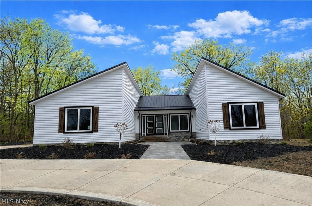 New construction ranch home with over 3000 square feet of finished space, including the finished basement rec room and full bath, set on a beautiful two-thirds acre lot! This single-level design offers four bedrooms and three full bathrooms on the main floor. The open-concept layout seamlessly connects the spacious living room with gas fireplace, dining area, and chef’s kitchen which includes a 48" gas range, smart refrigerator, drawer microwave, dishwasher. Primary suite includes 2 walk-in closets, en-suite bath with 2 separate vanity areas, private commode area, plus a walk-in shower with body jets, Blue Tooth speakers, LED lighting, rainfall shower. An attached two-car garage is included, and there’s room on the property to add an outbuilding (available as an upgrade with the builder). The extra-deep basement will be partially finished, adding a bath, additional living area, and a convenient walk-up to the backyard. Other features include: stamped concrete entry courtyard; private rear patio; tankless hot water system; Great Room with vaulted ceiling and huge fan; tons of storage including 2 walk-in closets in the primary plus a kitchen pantry; walk-up basement, great for storage or finish for additional living space; circular driveway with extra parking pad. NO HOA! Possible owner financing or rent-to-own.