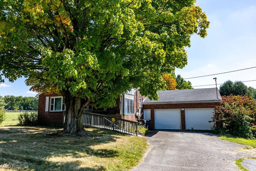 This 25-acre rural property features a home, a cluster of outdoor buildings, two ponds, and expansive private grounds that invite quiet moments and active use. Pursue your own vision, whether its a solitary single-family estate, a new development subdivision of several single-family homes (subject to local zoning, subdivision approvals, and covenants), or one grand mansion framed by water and greenery (also subject to approvals). The outbuildings on the property provide versatile storage, workshop space, or livestock shelter, while the acreage accommodates gardening, farming, or recreational pursuits; it’s ideal for hobby farmers, equestrian enthusiasts, or anyone seeking a tranquil setting with abundant outdoor space and water features.
Arrange for your private tour today.