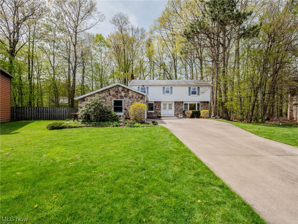 Incredible opportunity to own in North Solon! (Solon School District). Cheswick Subdivision. Beautiful Wooded lot on Quite Cul-de-sac.!  Colonial style 4 Bedrooms and 2.5 bathrooms offers New vinyl Plank Flooring in Foyer, Kitchen and Half Bath. Bright Living room and Spacious Family room with Wood/Gas Fireplace.  Generous size Laundry room off Family room. 4beds on Second floors. Huge Master room has Extra Seating area (Currently use as Office). Finished Basement provides additional recreation space and storage space. Large Private Backyard offers Deck, Patio with built-in natural gas grill and Walkway that are perfect Relaxation and Getaway space. The location in North Solon is outstanding and close to parks, shopping, grocery, and highways for quick access everywhere. Excellent commuting to Solon, Beachwood, Chagrin Falls, Downtown Cleveland. ONE YEAR HOME WARRANTY is included. Schedule your showing today!