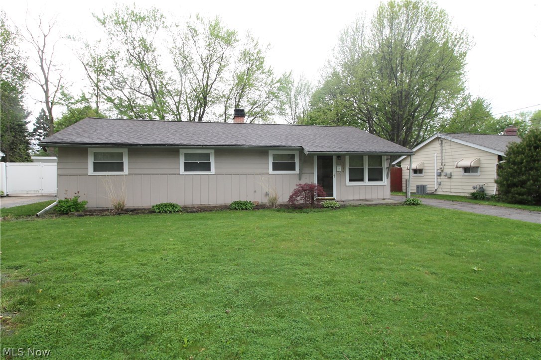 Only 0.7 miles from beautiful Lake Erie and Overlook Beach Park, this warm and inviting ranch is located on a quiet street in a great neighborhood.  Beautifully maintained and updated featuring an open floor concept from your living room to your spacious, bright eat in kitchen with an abundance of cabinets for storage and a built in pantry with a lovely tile back splash. All newer appliances (2-17) stay including washer and dryer.  Substantial living space is enhanced with lots of natural lighting with newer windows with blinds throughout.  Living space also provides a TV mount for your large flat screen TV.  One full bath in addition to a 1/2 bath in Master bedroom. Sliding glass doors off kitchen onto large patio, overlooking a partially-fenced large back yard, with updated electric and flood lights to enhance the beauty of a newly landscaped backyard. Home offers a two car garage. Updated lighting throughout the home, ceiling fans, newer carpet, flooring, and bathrooms just to name