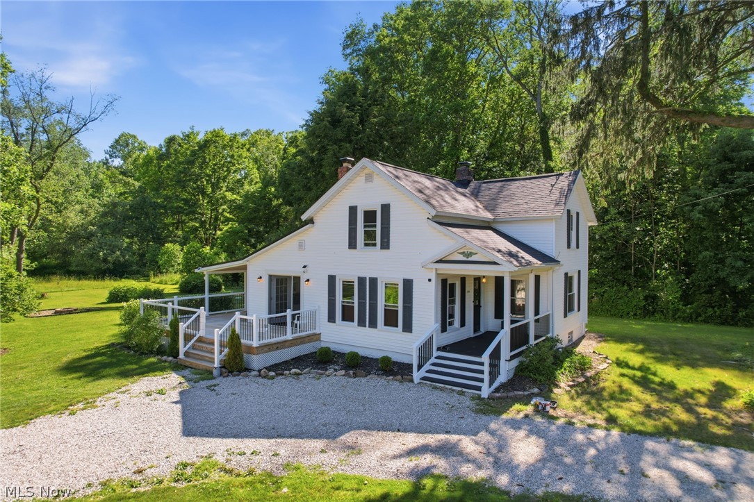 Looking for a move-in ready home with modern updates, historic character, and a truly exceptional outdoor setting? This beautifully remodeled 3-bedroom century home in Munson Township combines the charm of yesterday with the peace of mind of extensive 2024 renovations, all within the highly sought-after Chardon School District.

Welcome to this completely remodeled 3-bedroom, 1 full and 1 half bath century home where timeless character meets modern convenience. From the inviting covered front porch to the picturesque grounds, every detail has been thoughtfully updated and designed for comfortable everyday living.

Inside, you’ll find a stunning remodeled kitchen featuring vaulted ceilings with exposed wood beams, creating a warm and inviting gathering space. The extensive 2024 renovation includes a new kitchen, updated bathrooms, waterproofed basement, new septic system, roof, windows, furnace, air conditioner, vinyl siding, and much more. The first-floor primary bedroom offers convenience and privacy with its own private bath, while the laundry room has been relocated to the second floor for added functionality.

Step outside and experience what truly makes this property special. A huge covered rear deck overlooks a breathtaking park-like setting complete with a private pond, fire pit, zip line, and open green space perfect for entertaining, recreation, or simply enjoying nature. The property is surrounded by newly designated protected conservation land, preserving the natural beauty and privacy of the setting for years to come.

A large detached garage provides ample space for vehicles, storage, hobbies, or workshop use. Rarely does a home offer this combination of historic charm, extensive renovations, outdoor amenities, and protected natural surroundings. Located in Munson Township and the award-winning Chardon School District, this turnkey property offers the perfect blend of comfort, privacy, and lifestyle.

Schedule your private showing today.