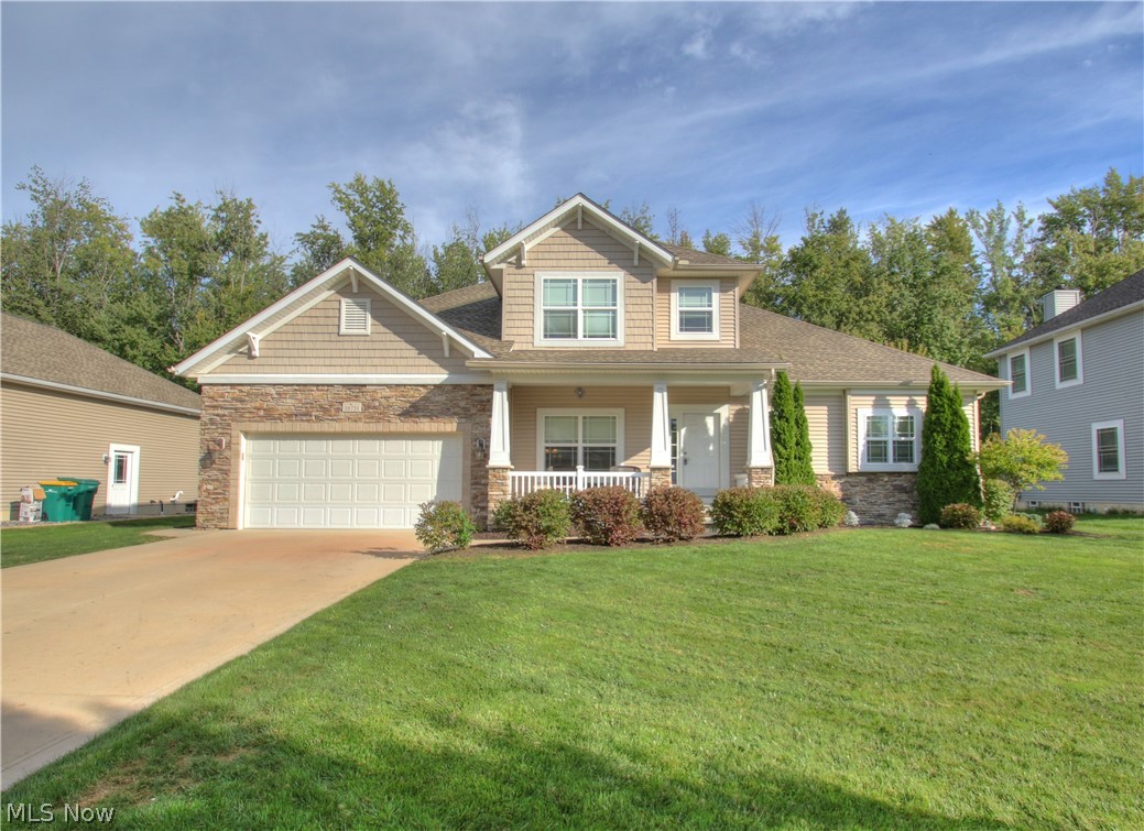 Gorgeous 2009 custom built by Barrington Homes! Spacious open eat in kitchen with granite countertops, ceramic tile backsplash, stainless steel appliances, center island, oak hardwood floors and built in wine rack and pantry. Kitchen opens to living room with gas fireplace. Dinette walks out to private oasis featuring stamped concrete patio with built in fire pit, above ground pool with wrap around deck and huge fenced in yard. 1st floor master suite with large walk in closet and nice master bath with his/her vanity and jacuzzi tub. 2 huge bedrooms up with additional bath. 1st floor laundry. Basement features large recreation room, billiard room plus 1/2 bath. This home is loaded with higher end custom finishes and a must see!