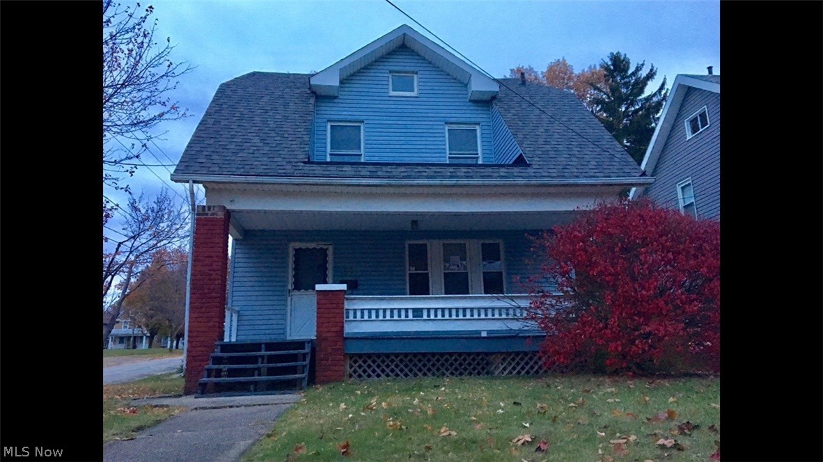 This large colonial offers awesome curb appeal and has LOADS of potential!!! Great exterior aesthetics including a large front porch, vinyl siding and dimensional shingle roof!!! Pretty corner lot with large back yard!!! The interior offers GORGEOUS woodwork and room to roam!!! Third level walk up offers two tandem rooms that could be used for additional living space, bedrooms or storage!!! Very spacious and charming home - call today it won't last!!!