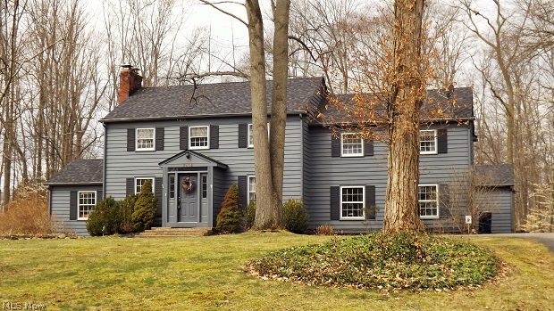 Classic 5 bedroom Colonial home on over 1 acre wooded lot in Historic Hudson. Beautiful woodwork and hardwood floors throughout. Cozy side office w/fireplace and bank of windows. Large sun room or breakfast room overlooks tranquil wooded lot. Tons of space for entertaining. Circular drive. Beautiful neighborhood.