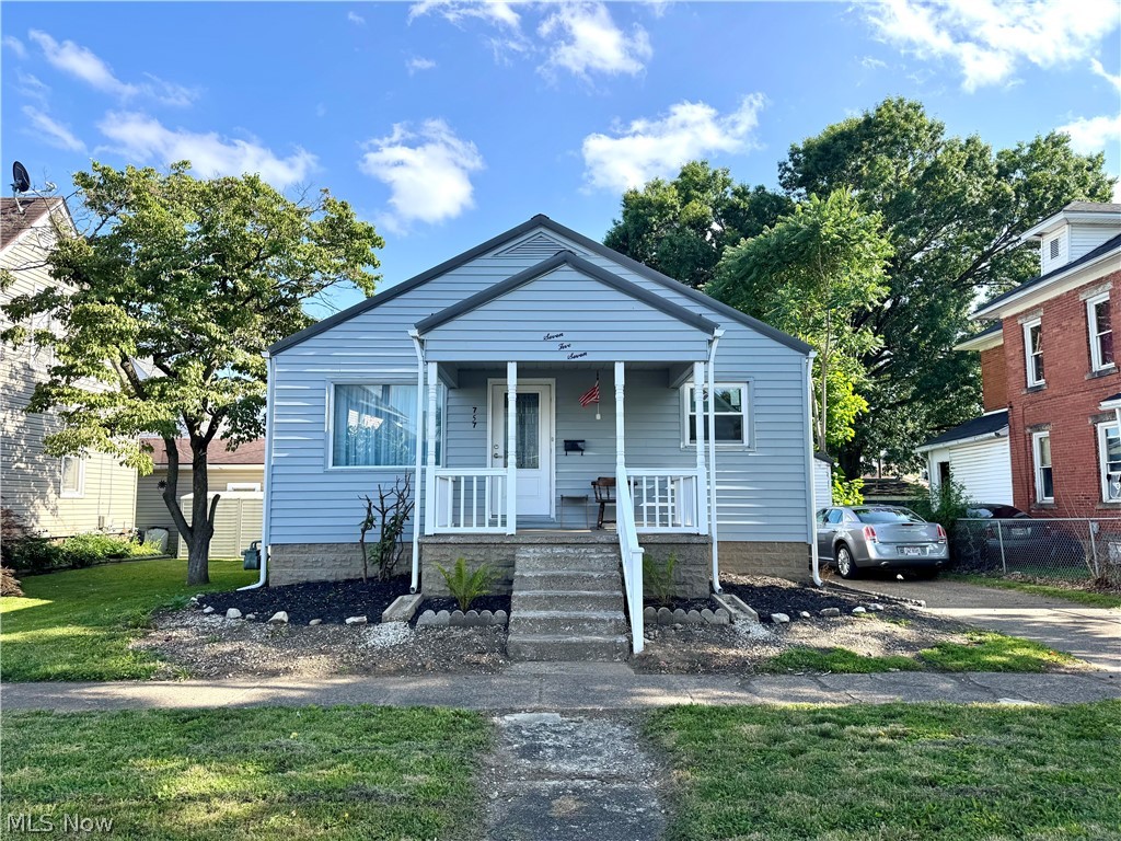 757 Elm St is a remodeled 2-bedroom, 2- bathroom home with a partially finished basement and a 1-car garage.  This home has been thoroughly cleaned and updated to include; new furnace, AC, windows, bathroom, gutters, flooring and paint. Also updated are the kitchen cabinets, kitchen appliances, exterior paint and front porch.  The clean, dry basement has a finished room that is perfect for a family room or additional bedroom, and a full bathroom. Also, worth noting is the abundant storage, and the nice sized lot with alley access.  Call your agent for your showing!