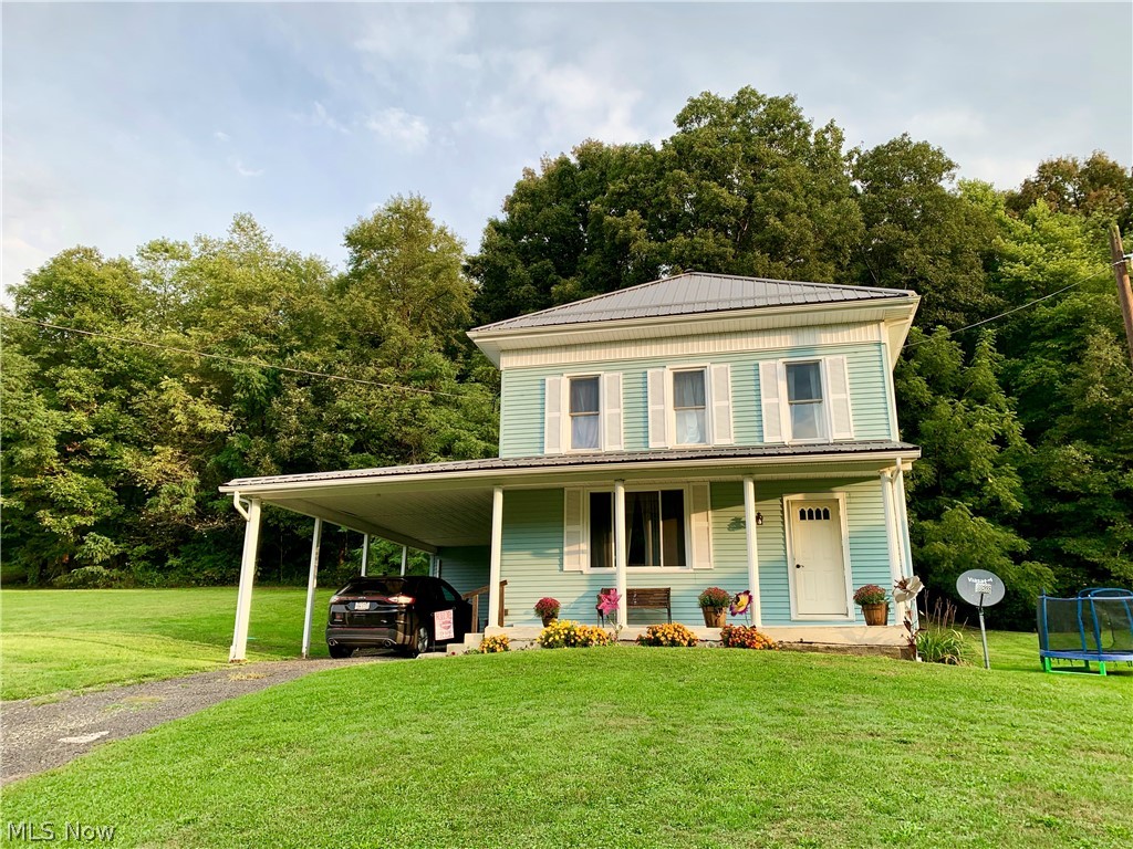 Beautiful remodeled country home in a private setting. This home offers 4 bedrooms, 2 full baths, main floor laundry and multiple outbuildings! Main floor master suite that walks out to the rear private patio. Both bathrooms and kitchen have been completely remodeled in the last 2 years. New high efficiency oil furnace / heat pump and a/c. New metal roof on all buildings in the last year ! 1 carport attached to home, 2 car detached garage, and a large 40x32 pole building complete with new cement floors and a motor jib crane! Newly built chicken coop is perfect for your chickens and fresh eggs! 8 acres of mostly wooded acres is the hunters dream! Mostly new vinyl windows on the main home. Don't miss your opportunity to own all this! Call us today to schedule a private tour. New garage doors and openers for pole building have been installed! This home is turn key and immediate possession after closing is available!!!