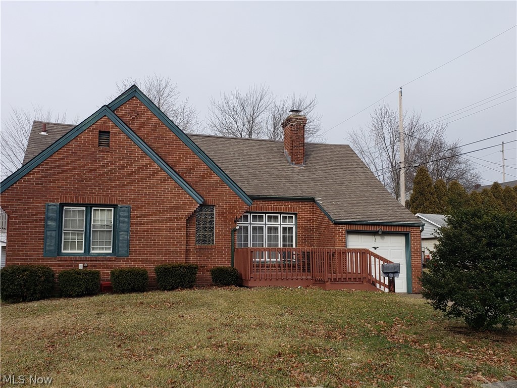 This all brick bungalow overflows with living space.  As you enter you will find hardwood floors throughout. The living room features fireplace and picture window, dining room with french doors open to 3 season sunroom that looks out to a huge back yard. Across the street (back of home) you also have a huge 3 car detached garage, a mechanics, boaters, motorcycle, RV, crafters dream. The potentials are endless.  Back inside, the basement has partially finished living space, with bar area. Upstairs features bedroom, adjoining to another room, and a huge closet. This home has much potential.