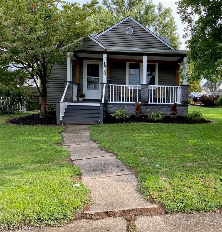 This is your finest opportunity! These home owners have put a lot of love into their home & it shows. From the front porch to the back deck you will be amazed! The bedrooms have beautiful built ins plus an organizational lover’s dream closet in the front bedroom! The main floor features a gorgeous updated kitchen with granite counters, tile back splash & custom pantry with pull out drawers. The main bath rm has been updated.. The living  & dining rooms are very spacious & open. Quarantine is not a problem with your own personal oasis in your backyard. A covered deck,  bar  & a bonfire pit area, make it a great place to entertain.  There is an extra side lot for family activities. Winter is coming… still not a problem! The finished basement is amazing! There is a rec room, large full bathroom with a heated towel rack & shower.  The wet bar has plenty of cabinets , you wouldn’t have to leave! The basement also has storage,  laundry rm with a sink & counter top space with cupboards. This