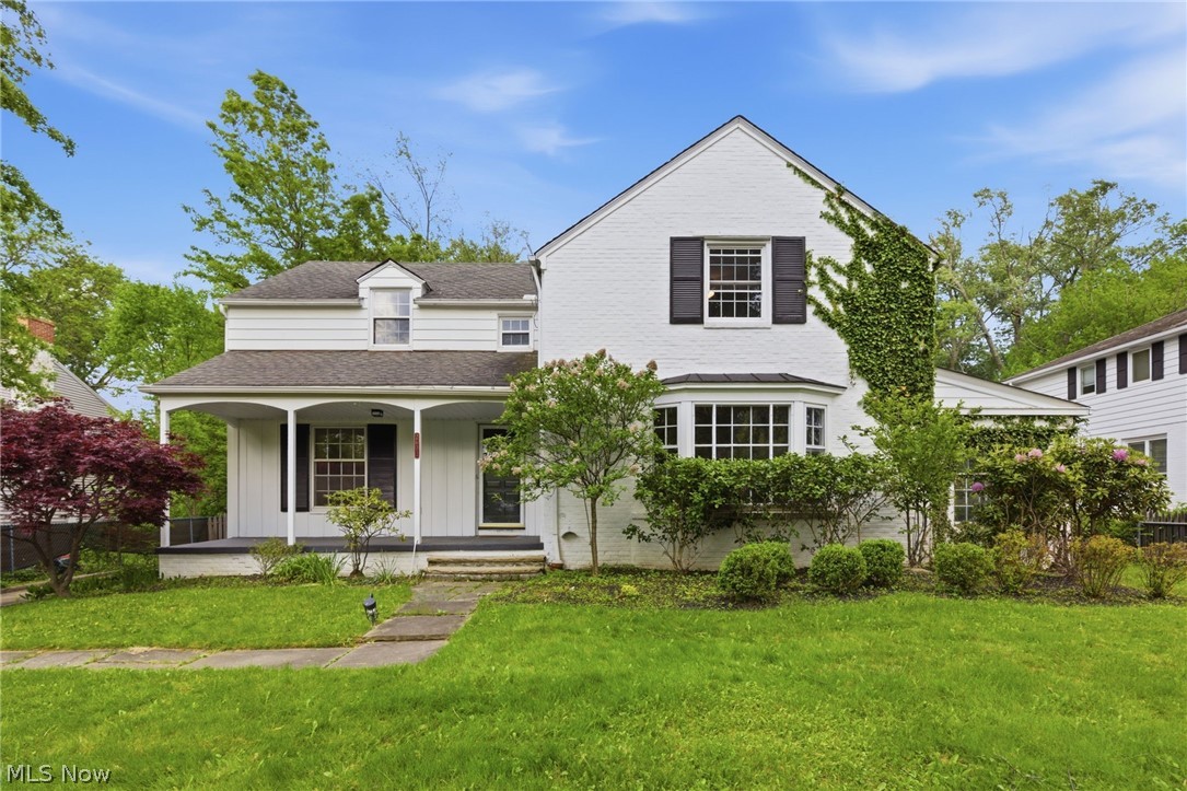 Welcome home to this terrific four bedroom, two and a half bath Colonial nestled in the highly desirable Mercer neighborhood of Shaker Heights. This freshly painted beautiful property seamlessly blends classic architectural charm with modern updates and spacious  living spaces. The heart of the home features a bright eat-in kitchen complete with stainless steel appliances and beautiful  floors. This inviting culinary space opens directly to the comfortable family area and overlooks a very large  fenced backyard that is perfect for outdoor activities.
For more formal gatherings, the light and bright living room offers an expansive space anchored by a cozy fireplace, elegant moldings, classic built-ins, and a beautiful bay window, with  original hardwood floors . Steps away, a fabulous and large side screened-in porch with brick flooring provides an exceptional extension of the living space, ideal for seasonal entertaining or quiet relaxation. The classic layout continues into a formal dining room featuring built-in cabinetry and original hard wood floors.
The second floor hosts all four spacious bedrooms and two modern updated full bathrooms, including a large primary suite equipped with its own full updated bathroom and private shower. Additional living space is found in the finished lower-level recreation room, which features a second fireplace and offers a versatile area for a home gym, media room, or play space. Complete with a convenient two-car attached garage, this Shaker Heights gem is an incredible find in an unbeatable location.