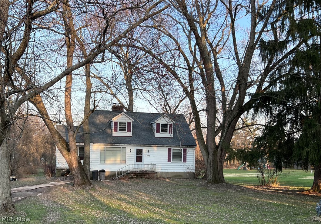 Fantastic investment opportunity.  4 bedroom cape on a spacious lot. Living room with stone fireplace. Some hardwood floors. Full walkout basement with another stone fireplace. New roof 2020, new soil stack 2020, new hot water tank 2021, new thermostat 2022.  Could be a great family home with a few updates and a lot of elbow grease.