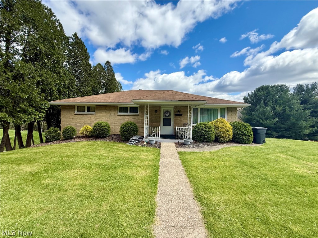 Welcome to this desirable brick ranch tucked away on a private street in the heart of Weirton. This inviting home offers three generously sized bedrooms and an expanded full bathroom, providing comfortable living with room to grow. Move right in and update at your own pace to truly make it your own.
Beneath the carpeting, you’ll find hardwood floors in all three bedrooms just waiting to be beautifully refinished and restored. Whether you’re enjoying the peaceful, private setting or hosting gatherings with family and friends, this home offers the perfect balance of comfort and versatility.
Don’t miss your opportunity to own this well-located gem—schedule your private tour today!