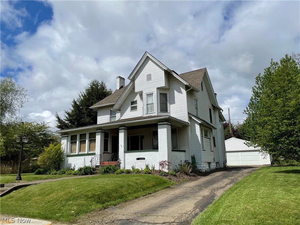 Outstanding in every way.  This five bedroom one and a half bath three story home incorporates the charm of the 1910 era with all of todays modern conveniences.  From the foyer entry you will be impressed with the lovely and spacious living area with gas fireplace .  The morning room will have the sun shining in and the french doors that lead to this area are beautiful.  The remodeled kitchen offers charming bar seating, modern appliances and impressive storage areas. Formal dining room will be the heart of the home.  First floor laundry and a charming half bath complete the first floor.  The second floor offers remodeled bath 2019, four spacious bedrooms and loads of closet storage plus a third floor owners suite with walk in closet and sitting area that is so unexpected and versatile. But that isn't all you will find an office on the second floor and if you home school your children this offers that area in the finished lower level plus an inviting play room.  The oversized two car g
