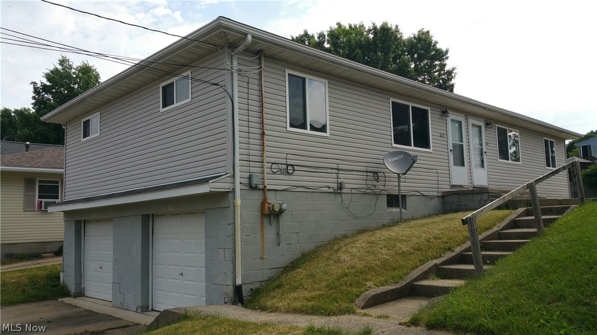 1456 Square Foot Ranch home multi family duplex  with a full basement and 2 car attached garage. This 4 bedroom 2 full bath duplex has 2 bedrooms and 1 full bathroom per side. The home has a FULL basement. Both units are fully applianced. All Appliances stay. 629 - 631 Fulmer Ave is located in Ellet off of Triplett Blvd. Great for quick access to 224, Canton Road/ 91 and the central interchange 77/76/277 north and south.  Close to Hatton Elementary school and Ellet High School.  The hot water tanks to both units are newer. Dont miss out on this move in ready opportunity in this market. Call for a private showing today
