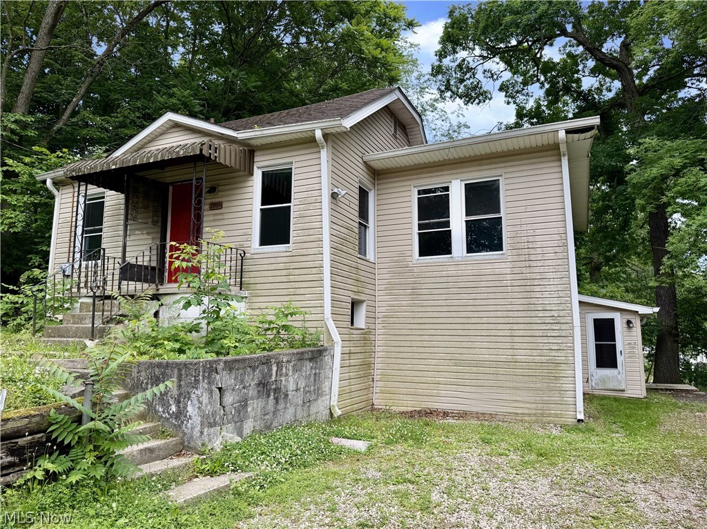 Opportunity awaits! This spacious 3-bedroom, 2 full bath home offers more living space than meets the eye and is ready for its next owner to bring it back to life. The main level features generous room sizes, hardwood floors throughout much of the home, a large eat-in kitchen, and an full bath.

The finished walk-out lower level includes an unofficial apartment/in-law suite complete with its own kitchen, full bathroom, and separate living space, offering endless possibilities for extended living, guests, a home office, or hobby space. (Buyers are responsible for verifying permitted use.)

Outside, you'll find a detached two-car garage with an attached workshop, providing ample space for vehicles, storage, projects, or equipment. The rear deck overlooks a private, wooded setting, creating a peaceful backdrop to enjoy.

With some cosmetic updates and TLC, this property presents an excellent opportunity for an owner-occupant, investor, or anyone looking to build sweat equity. Conveniently located near shopping, dining, and major roadways.

Schedule your private showing today and imagine the possibilities!