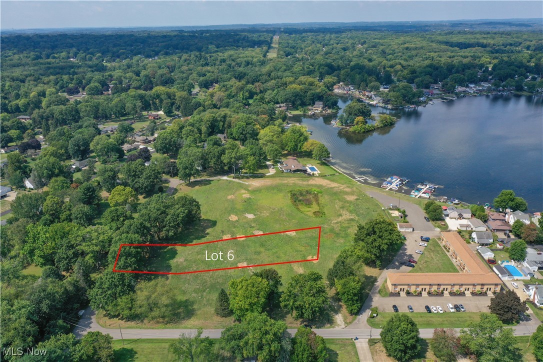 Welcome to Portage Lakes newest development, Kemppel Cove!  This New Franklin, premium, lake view lot features 1.007 acres and adjoins the community common space lakefront access to Turkeyfoot Lake.  Each lot will have an assigned dock space at the 6-slip dock and the lake frontage community area features a rebuilt seawall. This is 1 of 7 lots available in the community. Septic approved and Aqua water. Seller has proudly partnered with Rembrandt Homes as the exclusive builder for your new home! Manchester Schools.