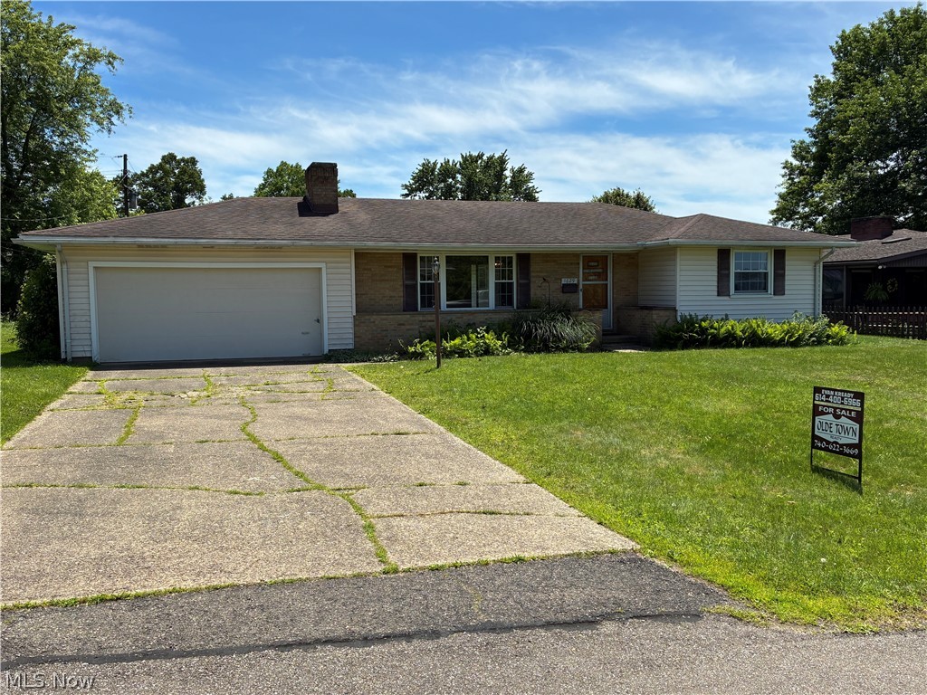 Welcome to 1629 Woodland Drive in the desirable Pleasant View Subdivision. The main floor offers 3 bedrooms and two full bathrooms, living room, and kitchen. The home has a two-car attached garage and a spacious front and back yard with a storage shed. There are plenty of built-ins for storage throughout, and a large basement with a finished room for an office or den. This home has beautiful hardwood trim throughout, and hardwood floors in the bedrooms. The windows on the main floor have been upgraded in recent years. If you're looking for an affordable ranch home with mid-century charm, this may be the one for you!