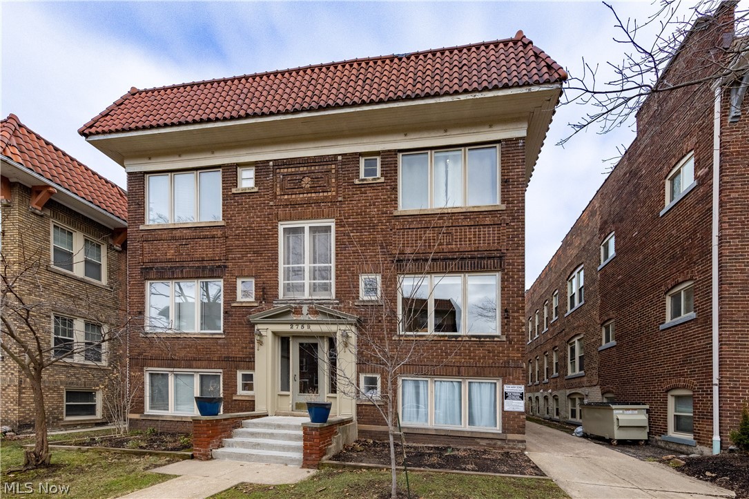 Location, location, location! Beautiful Condo with original charm in the heart of Coventry Village.