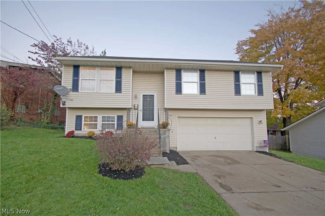 This 3 bedroom, 1.5 bath house with a 2 car attached garage is located in Firestone Park on a side road off of E Waterloo road in Akron. It has convenient access to shopping, I-77, Ohio State Route 8, Ohio State Route 224 (AKA SR 177) and I-76. This house has an open concept and has been updated throughout. The kitchen is large and open with plenty of counter space and new cabinets in 2016. In addition to all the cabinet storage there is also a pantry. There are sliding glass doors which lead to the back deck which overlooks the large fenced in backyard. The deck has stairs leading down to the backyard which is great for pets and kids! Off of the garage is a patio with a fire pit which is a great space for people to gather. The Master has His & Her closets and both bathrooms are new! Whats great about this house is there are 2 living spaces. The main is off of the kitchen and the second is in the finished lower level. This can be used as whatever you like! The 2 car garage has electric