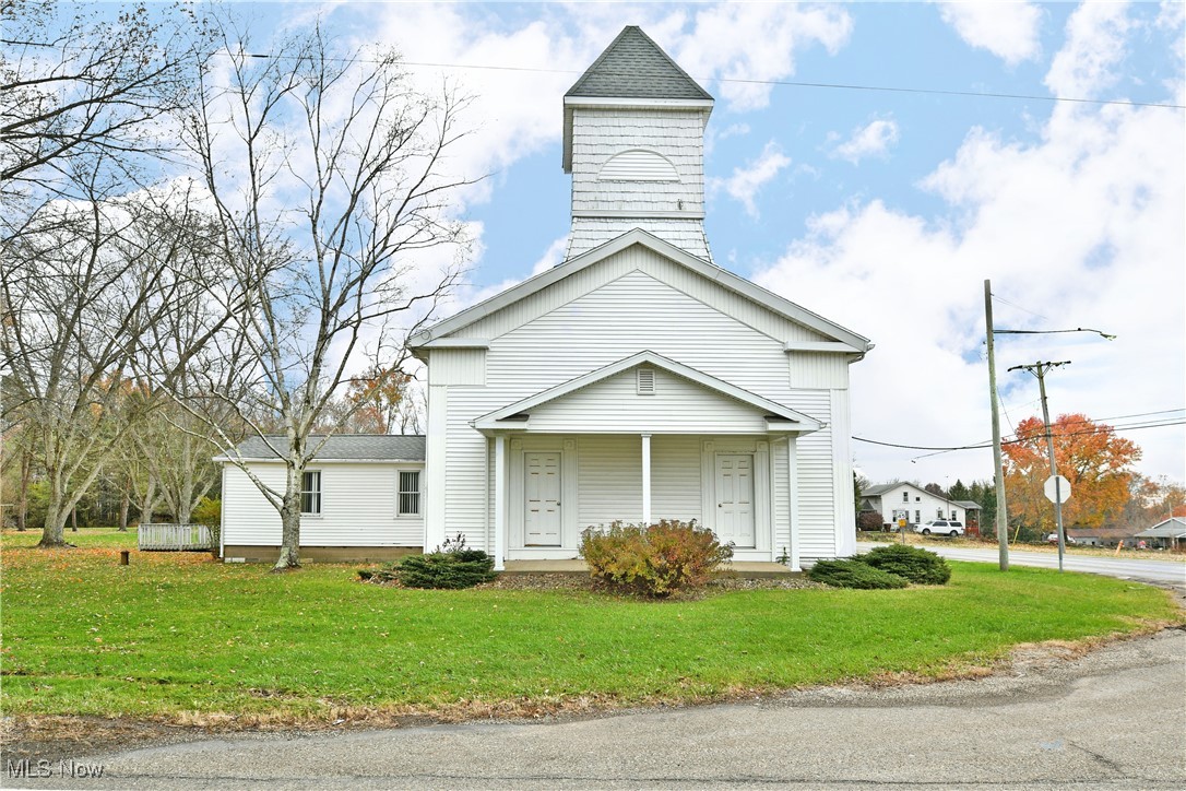 A rare opportunity in Fowler Township, this picturesque countryside church offers timeless character, exceptional functionality, and outstanding potential for a variety of uses. Perfectly situated with quick, direct access to State Route 11, the property provides convenient travel.
The building stands as a recognizable local landmark, crowned by its tall steeple and classic architectural lines. A mobility-friendly ramp leads to a welcoming foyer that includes bathroom facilities and utility access. The bright, open sanctuary features a split-nave layout, three rows of seating, dual front entrances, and clean sightlines—an ideal foundation for continued worship, community gathering, educational programs, or a creative repurposing project.
Outside, the church is supported by generous rear parking, accommodating visitors, members, or event guests with ease. The structure’s straightforward design makes it adaptable for transformation into a studio, office, event venue, workshop, or unique residential concept (buyer to verify zoning).
With its peaceful rural setting, strong visibility, and close proximity to major roadways, this Fowler Township church presents an exceptional standalone opportunity—perfect for those seeking a functional building with charm, flexibility, and room for inspired vision. Schedule your showing today and explore the possibilities!