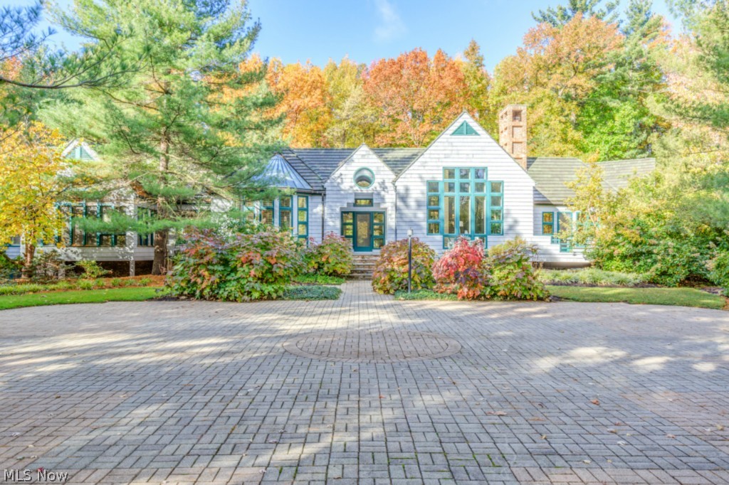 Progressive Reserve Auction (Not a live auction),NO EXTRA BUYER FEES! SUBMIT OFFERS NOW!Auction date is deadline for bids. 4500 SF Contemporary designed by Tony Paskevich, situated on a secluded 5 acre wooded lot,  4BR 5 1/2 BA & 4 fp’s, multiple decks & perennial gardens. Foyer w/ slate flring opens to a vaulted Living Rm w/ gas fp, wall of windows & wood paneled ceilings. Built of the finest quality includ. solid Oak hdwd flrs, cust. wdwrk t/o, cedar shake siding & cedar timberline roof. Gourmet eat in Kitchen w/ vaulted beamed ceilings, stainless steel appliances & granite c-tops opens to a warm & inviting Family Rm w/ fp. Kitchen walks out to the Sunroom. Huge Master Suite w/ fresh paint, new carpet, his & her walk-in closets w/ cust. organizers. Glamour Bath w/ a vaulted ceiling, marble flring, Jacuzzi tub, cust. shower, & his /her vanities. Library off of the Master feat. cust. built-ins & walks out to private Deck. 3 spare Beds all have been remodeled w/ newer carpet. Guest Suite has its own private bath & walks out to back decks. Lower level is equip. w/ a Rec Rm, Golf Rm w/ net, Exercise Rm & full Bath! The serene patio & deck area surrounds the in-ground heated pool equip. w/ a power cover.  A 5 car att. Garage.