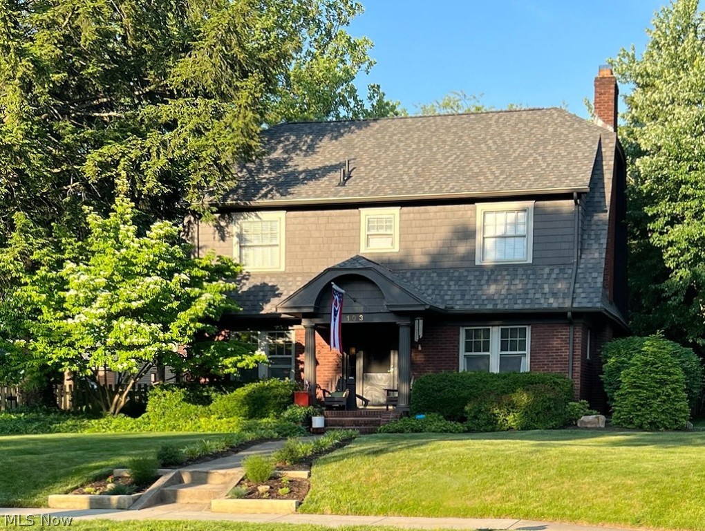 Love, care and good taste are the hallmarks of this stately, 5-bedroom brick colonial sitting perfectly on a double lot in 
West Akron’s prestigious Castle Park neighborhood. Brimming with loads of original character and the compliment of carefully chosen updates, the home will be one you’ll want to make yours for a very long time. From the curb you’ll see the landscaping in bloom, a newer roof and many architectural elements. Inside, the quality of the build will be evident the moment you step in. You’ll find exquisite millwork and beautiful finishes throughout. The kitchen has tall oak cabinets, stainless steel appliances, including a new dishwasher, and has a counter long enough for the cook and a couple of helpers, too! The main floor includes a generous living room with fireplace, a dining room and a library/study that can easily double as a home office. One of the five bedrooms is a hard-to-find, updated owner’s suite with a gorgeous ensuite bath. Another of the bedrooms was converted into a convenient dressing room. The outside of the home was very important to the owner. She knocked herself out with all of the things needed to make a perfectly lovely yard, and it's loaded with all sorts of perennial plants and greenery. Out back is a patio, and the yard is fully-fenced. You will have wonderful outdoor parties here. Improvements include new attic insulation, owner suite/master bedroom and bath renovation and attic dressing room, roof on the house and garage, exterior painting, plus 5 new ceiling fans, many new light fixtures throughout and a finished basement! If you favor a strong sense of community, the area offers so much, including Stan Hywet Hall and Gardens, the annual Akron Art Expo at Hardesty Park, Portage Country Club, schools with strong curriculums and loads of special student and family services, and churches. People are out, walking, running, children are riding bikes and neighbors stop to say hello. You will not want to let this one get away!