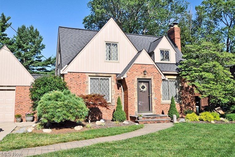 Great Opportunity with this absolutely gorgeous all brick bungalow style home on a desirable residential street!  This is a 2 Bedroom/1.5 bath home but this home is much LARGER than it appears! You have to visit this home and see the huge Family Room addition with a dramatic fireplace and abundant natural lighting with the many windows that view the super cute backyard! Walk in from the front door and enter the Foyer area, See the gorgeous hardwood floors in the large stately Living Room with fireplace and the formal Dining Room with built-in cabinets! Enter the updated Kitchen with eat-in sitting area with sliding doors to access the backyard wooden deck area! This beautiful updated kitchen has granite countertops and loads of cabinet space!  All newer Kitchen appliances stay as well as the washer and dryer! See all your Holiday Gatherings being held in this spacious Family Room! The entire home has an open floor plan! The second floor has two generous size bedrooms and Full Bathroom!