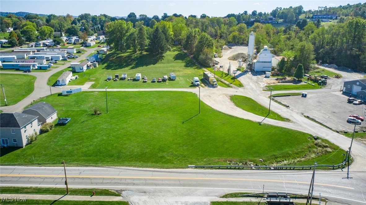 Opportunity has arrived! Secure this valuable 1.77 acres and make it your own. Enjoy 260 feet of road frontage on a busy corner of Byesville, boasting 7,000+ traffic count daily. Dreaming of owning the next franchise restaurant in town? This could be your chance - this property is ideal for a drive-thru operation with roadway on each side and plenty of room to build and still have parking available for customers. Consider building your business here!
