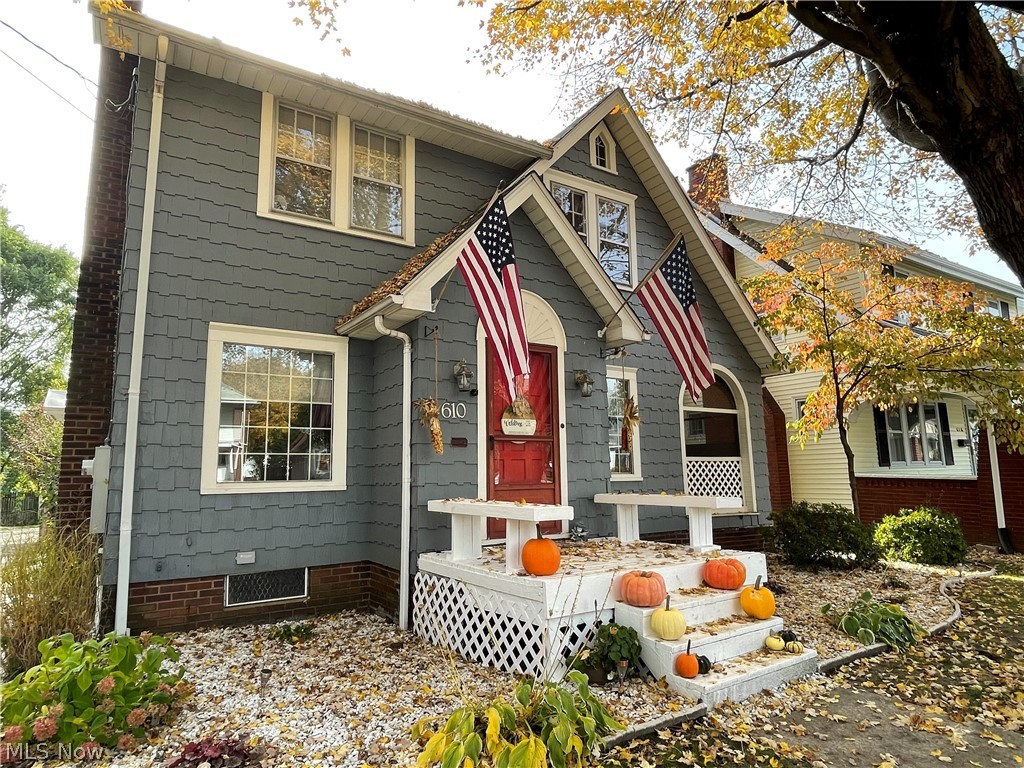 Charming 3 bedroom, 1.5 bathroom Colonial Home in Canton!! This Century home comes with charming hardwood floors in the 3 bedrooms located on the second floor, a fireplace in the living room, and original wooden banisters.There is a enclosed sunroom area perfect for morning coffee. The basement has a finished Rec. room complete with a bar. The third level has a finished space that could be used for auditions entertainment space, kids playroom, or additional storage. The back Yard is beautiful with a back deck, fire pit, and hot tub! There is a two gar garage. A/C was updated in 2019 and the roof was done in 2009.