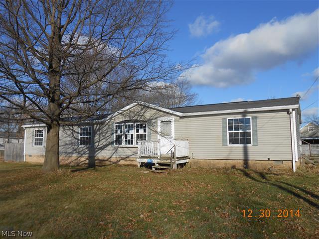 Ranch-style modular home located on a quiet street, fenced-in back yard, living & family rooms, open concept kitchen with dining area with slider to large wood deck, master bedroom has a large master bath, plus 3 nice size spare bedrooms with ample storage areas.  Equal Housing Opportunity.  Sells As Is.