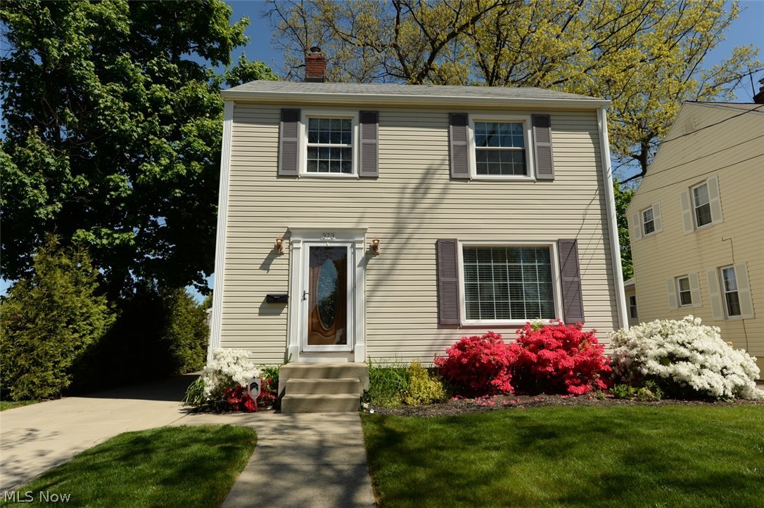 Pristine!!  Entirely updated colonial with stunning original hardwood floors and an amazing outdoor space.  New kitchen, new 1/2 bath and remodeled full bath.  Waterproofed basement with sump pump, separate utility area and finished rec room with tons of storage.  New vinyl siding, newly built 2.5 car garage, new driveway, sidewalk and front steps.  Sliding glass doors open up to a newly stained deck, brick patio area, large mostly enclosed back yard with a fire pit.  Newer double hung windows have custom blinds and window coverings.  New programmable thermostat and alarm system controllable by cell phone.  Must see!!