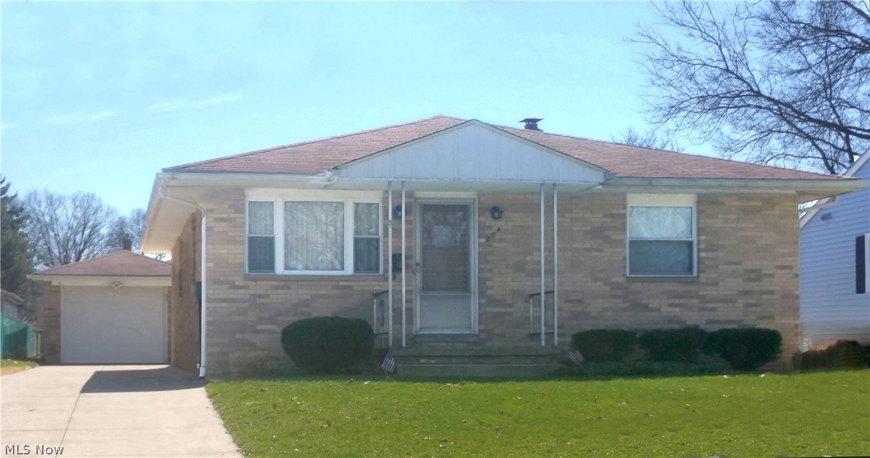 Remember the days of family gatherings when people brought their plates upstairs, downstairs, got together and played games, maybe a little ping pong or pool in the basement, had great fun and spent quality time with each other? This house is perfect for that! All-brick construction and well-built, this one-owner home has been loved and cared for by the same family for over 50 years. With three bedrooms and a bath up, a large recreation room and a basement bath down,  there’s room for everyone. In fact it’s so accommodating, the owners served over 30 people at the holidays! The kitchen is nice, has lots of storage and comes with all of the appliances. The dining area is close by and was designed to hold a 6 ft. dining table! You’ll love the retro bath with its big mirror and base cabinet large enough to store about anything you’ll need. The home is solid, the floors are hardwood, the rooms are good-sized, the windows have been replaced for energy efficiency, and it’s a ranch so your ma