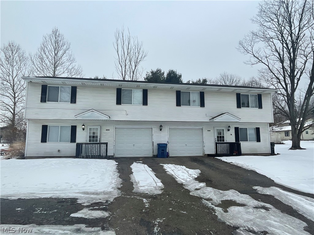 A fully occupied 2 unit turnkey investment.  These large units have 2 bedrooms and 1.5 baths.  There are living rooms, and family rooms in the lower levels.  Each unit has its own attached garage.  There is a large side yard.  The units have been updated, and the roof and furnaces are around 5-6 years old.