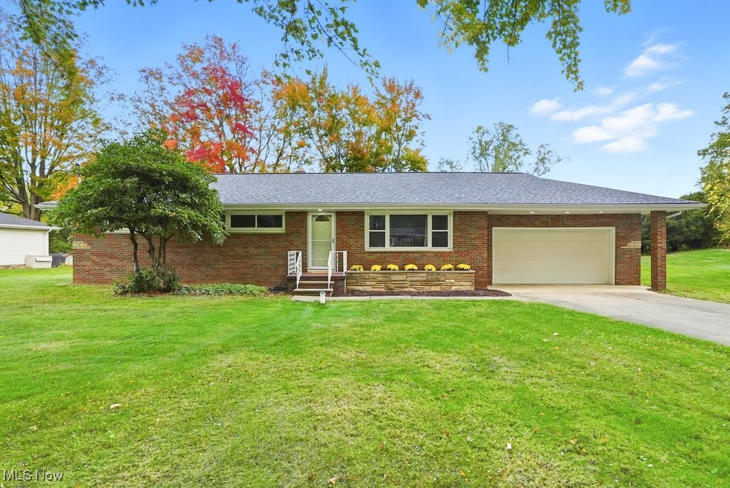 Looking for a move-in ready home with plenty of updates? You'll love this 3-bedroom, 1-bath brick ranch sitting on over half an acre of land.
Step inside to find an updated kitchen, a freshly updated bathroom, and new carpeting. Big-ticket items are already done. Newer roof, windows, furnace, central air, electric. The updated eat in kitchen has granite counter tops and ceramic tile floors. The sliding door off of the kitchen leads to the spacious back yard. The bathroom has been updated with new vanity and tile work. There is a shower and bathroom area in the basement ready to be finished. Lots of storage area in the basement as well. The attached 2 car garage has been freshly painted. You can move right in and start enjoying your new home.