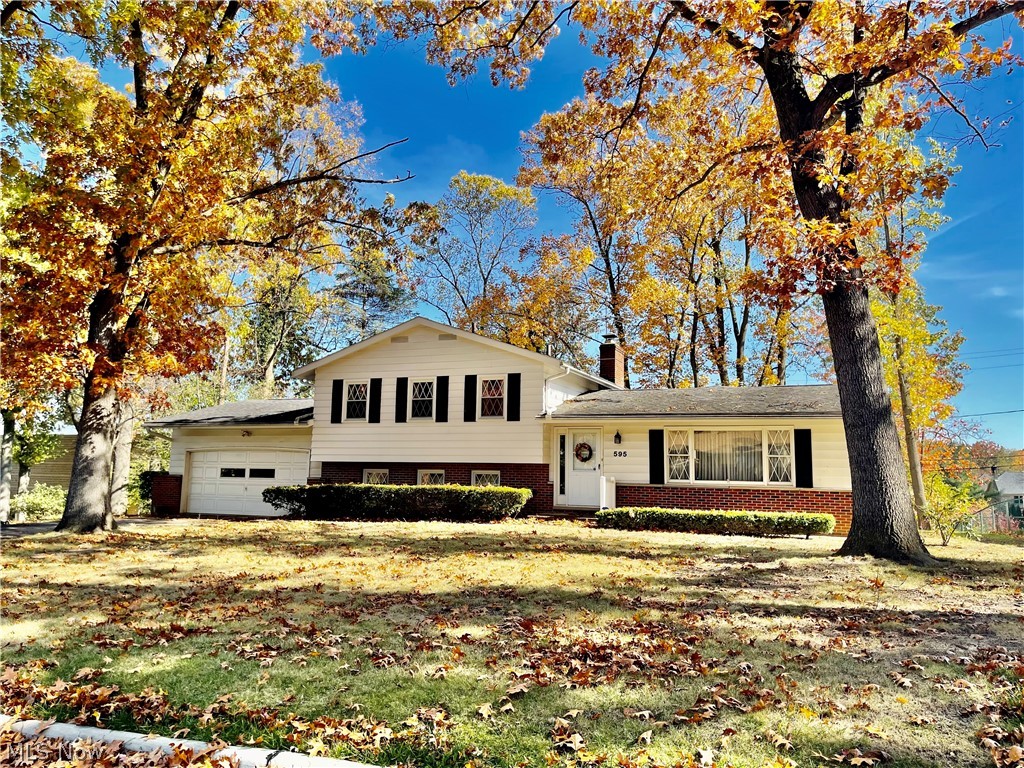 Spacious and well maintained Split Level with FIRST FLOOR BED/BATH. 3 additional bedrooms up with full bath and a bed/full bath in the lower level. Very large living area, formal/casual dining room. Kitchen with many cupboards and newer appliances. Lovely breakfast room with view of the treed yard. Family room has ease of access to the garage and the large screened-in patio for great outdoor living. The basement level is also finished w/small bar. Laundry/utility room is unfinished. Amazing location close to transportation, churches, schools, banks, library, groceries, shopping mall and fine dining. Enjoy updating this great find of a home that has all the space you need! New Furnace, 3 years; Air Conditioner, 2 years; Range, 2022; Fridge, 2020;Roof is approximately 15 years; Newer windows in the bedrooms upstairs.