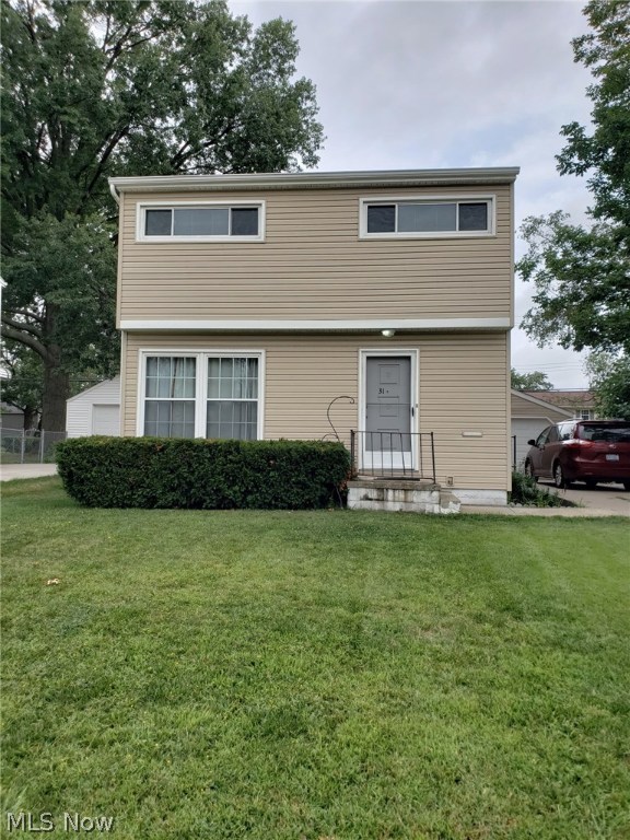This house should be on your list! Nice open floor plan with all new carpet and fresh paint in 2018. Siding, windows, roof, sliding door from dining area to a deck  for warm weather entertaining, and HW tank in 2013. Remodeled kitchen with newer cabinets, ceramic tile back splash, stainless steel appliances 2013, and new dishwasher 2018. Remodeled bath 2018, and a recreation room that adds another 238 square feet of living space! Back yard is completely fenced and the garage has an additional storage area with new service door. Conveniently located near shopping and schools, this home is a must see and is move- in ready.