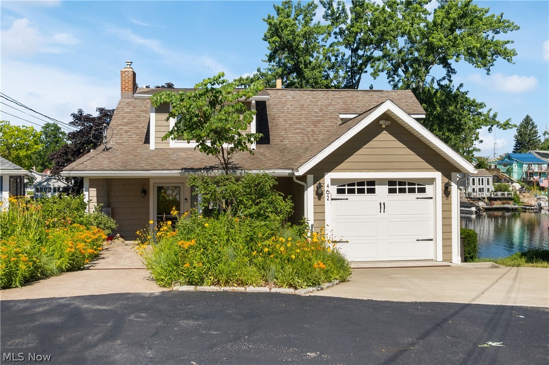 Welcome to this stunning lakefront home situated on the main chain of Portage Lakes. This inviting home has a WOW factor. This is a four ?bedroom home with a ?one car attached garage. ?Two and half bathrooms There ?is a beautiful updated kitchen in this home. Upon entry at the front door, there is a large ?living room ?with a georgeus view of the lake . This home is absolutely move in ready and awaiting a new owner. Stop looking and start packing!! Call to schedule a showing today?. Public water and Sewer!