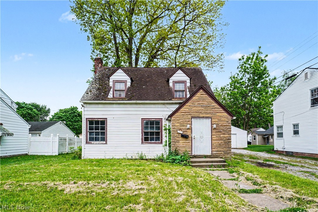This charming Cape Cod home, while in need of a little TLC, is located in the perfect neighborhood to bring it back to its glory and truly make it shine. With some smart updates and a little labor of love, this house could become a wonderful starter home or a great investment property to generate extra income.  The home already has a strong start when it comes to curb appeal, featuring a front door beautifully framed in stone. Inside, the living room offers a fireplace that could easily become a warm and inviting focal point with a few improvements.  The eat-in kitchen provides plenty of space to create the kitchen you have always dreamed of cooking and entertaining in.  Some people only see what is visible to the eye, while others see the possibilities, put in the work, and reap the rewards. This little house is simply waiting for that person.