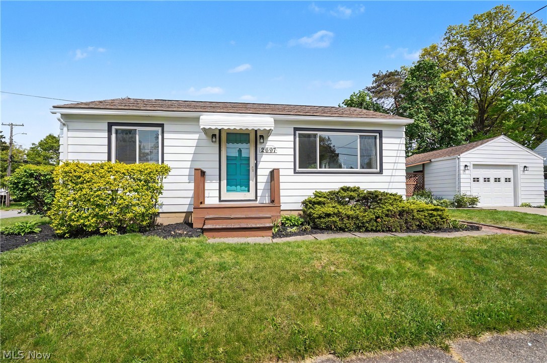 Fresh, bright, and thoughtfully updated, this ranch home is completely move-in ready for its next owners. Inside, you’ll find a welcoming layout with 2 bedrooms and 1 full bath, along with stylish updates throughout. The kitchen features granite countertops, stainless steel appliances, fresh subway tile backsplash, and white shaker cabinetry finished with updated hardware. Fresh paint and new or restored flooring add to the home’s crisp, refreshed feel. The partially finished basement offers valuable extra living space and includes a bar area perfect for entertaining, game nights, or relaxing at home. Outside, enjoy the charm of brick pavers, a deck and patio space for gathering, plus a covered area alongside the one-car garage ideal for grilling, gardening, or additional storage. A well-maintained home with updates already done — all that’s left to do is move in and enjoy.