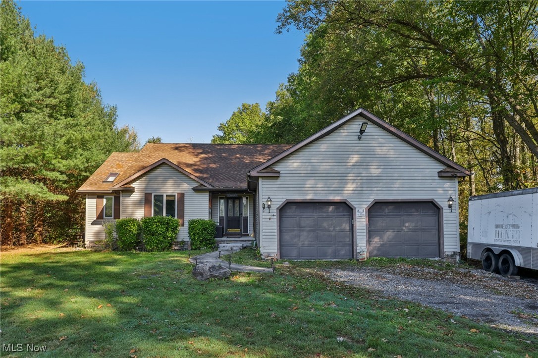Welcome to this sprawling ranch with tons of space, comfort, and country charm! This home offers room for a large or growing family, featuring 6 total bedrooms — 3 on the main level and 3 more in the fully finished basement — along with 3 full bathrooms (2 upstairs and 1 downstairs)! Step inside to find new Pergo flooring throughout the living room, bedroom, and master suite. The inviting living room boasts a nice wood-burning fireplace, while the formal dining room and eat-in kitchen make entertaining a breeze. The laundry room is conveniently located right off the kitchen, and all appliances stay — including the washer, dryer, basement refrigerator, and gazebo refrigerator! The spacious master suite features double doors leading to the master bathroom and a sliding exterior door that opens to the backyard. The forced electric air heat system (new within the past year) and electric baseboard heat (individually zoned), and a pellet stove with fan ensure warm and cozy comfort in the colder months! The finished basement offers tons of additional living space, perfect for guests, hobbies, or a rec room. Outside, enjoy 1 acre of property with a farm-fenced in backyard, fire pit, and dog ramp off the deck for your furry friends. The incredible 15x18 gazebo with bar area features rope lights, solar lighting, a ceiling fan, water feature, and full patio setup — all included! The oversized 24x24 garage with a 7’ door provides plenty of space for vehicles and storage. Additional updates per the seller include a new sump pump and new septic aeration pump (1 year ago). The well water offers a UV lighting system to help keep water purified. This home truly offers it all — space, functionality, and modern comfort in a peaceful setting. Don’t miss your opportunity to make this one-of-a-kind property your forever home!