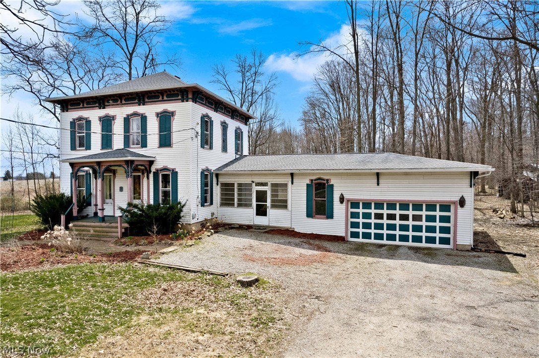 Pioneer Home looking for someone to bring it back to it's original charm.  This historic home sits on over 2 acres at Wooster’s North End.  Built in 1880 this home was moved in 1970 from Route 3 to it’s current location.  Some restorations have been done over time.  A Geothermal System with central air was installed in 2016 and roof in 2017. The massive garage opens to a breezeway that takes you into the kitchen, full bath, dining room and office.  Upstairs are 3 spacious bedrooms and a full bath. The foundation is in great shape and features a walkout basement, rec room with bar and wood burner as well as the laundry room.  This home will require some repairs and cosmetic updates.  It is being sold “As-Is” and priced accordingly, It will not go FHA or USDA.